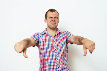 man showing a thumb down gesture