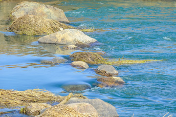 large stones boulders in the river