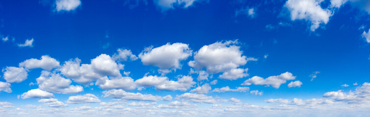 Naklejka na ściany i meble Blue sky and white clouds. Panorama clouds in the blue sky background