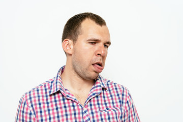 Obraz premium Man shows tongue