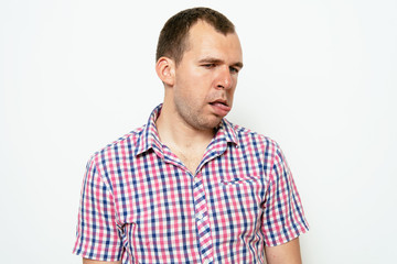Man shows tongue