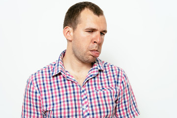 Fototapeta premium Man shows tongue