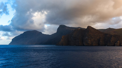 view from the sea with the eastern coast of St. Helena island in the Atlantic Ocean