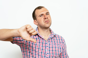 man showing a thumb down gesture