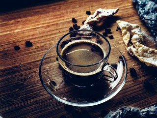 cup of coffee on wooden table