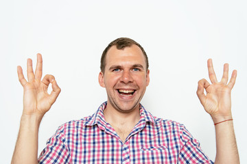 man shows that everything is fine, do not worry. all okay. Gesture. Close portrait.