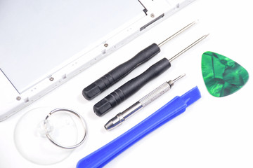 Body art on the body and hand of a girl glowing in the ultraviolet light.