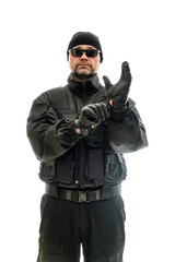 Concept Isolated portrait on a white background man in black police uniform and black glasses and gloves