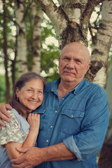 Fototapeta premium smiling couple in summer country garden