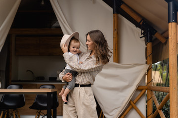 mother plays with baby 