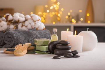 Fototapeta na wymiar Spa composition with Christmas decoration. Holiday SPA treatment. Zen and relax concept.