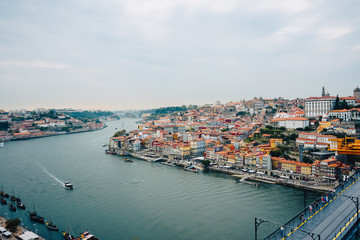 Fototapeta na wymiar Porto, Região Norte/Portugal - September 16 2019 : View on Porto City with many beautiful and colorful Buildings.