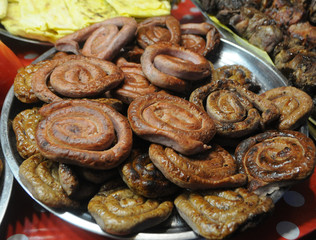 Sausage on a tray during the New Year's fair in Kiev, January 4, 2019.
