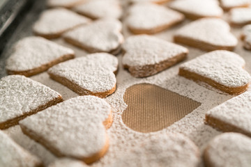 freshly baked heart-shaped cookies prepared on Mother's Day. Sugar, Cinnamon, and lots of love