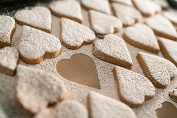 freshly baked heart-shaped cookies prepared on Mother's Day. Sugar, Cinnamon, and lots of love