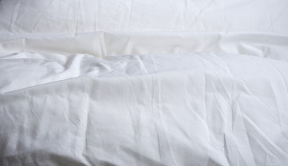 White texture of the blanket. Beautiful advertising background. Minimalism. Coziness