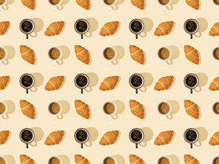 top view of croissants and coffee on beige, seamless background pattern