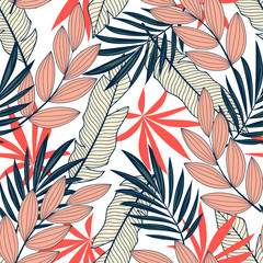 Original seamless tropical pattern with bright plants and leaves on a white background. Seamless pattern with colorful leaves and plants. Exotic wallpaper. Hawaiian style.