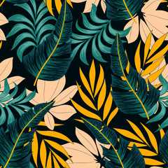 Fototapeta na wymiar Original seamless tropical pattern with bright plants and leaves on a dark background. Beautiful seamless vector floral pattern. Modern abstract design for fabric, paper, interior decor.