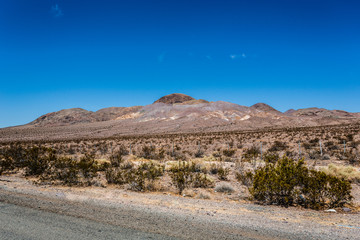 A view of 15 Freeway from an overpass heading North towards Las Vegas
