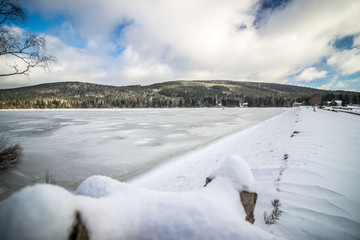 Winter scenery of water reservoir Sous located in Jizera Mountains