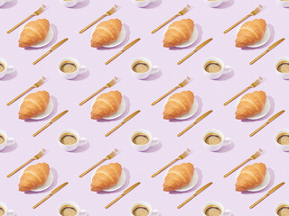 golden forks and knives, croissants and coffee on violet, seamless background pattern