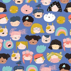 Seamless pattern of kids faces on a white background