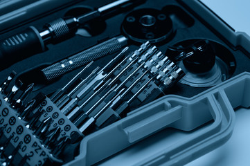 . A set of professional tools in a case for repairing phones, smartphones, computers and other...