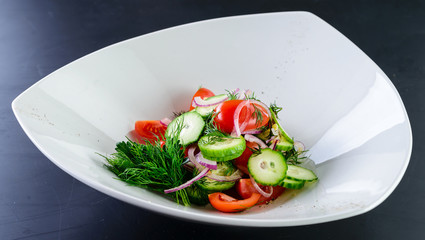 fresh vegetable salad of cucumber and tomato
