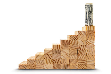 Dollar standing on top of a stairs