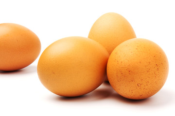 Brown chicken eggs, isolated on white background.