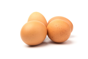 Brown chicken eggs, isolated on white background.