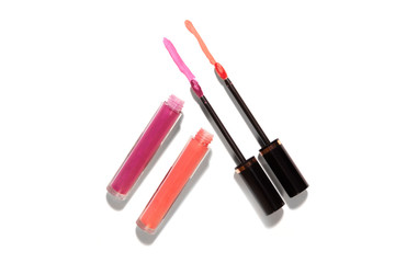 Lip color pink and orange in liquid bottle and applier 