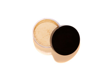 Face loose makeup powder. Real cosmetic powder in the black round glossy plastic case cover...