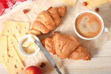 Croissants with cheese and butter for breakfast