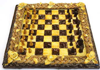 Beautiful artistic birthday cake in the form of chess board