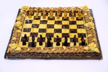 Beautiful artistic birthday cake in the form of chess board