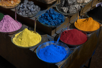 Colorful dye pigments and minerals in the medina of Marrakech, Morocco.