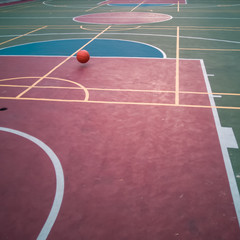 Bouncing ball in a basketball court.