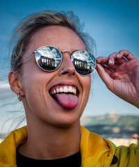 model smile yellow blonde tongue glasses athens