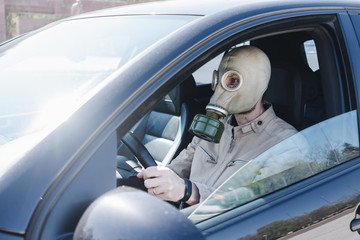 Man in a gas mask, quarantine coronavirus