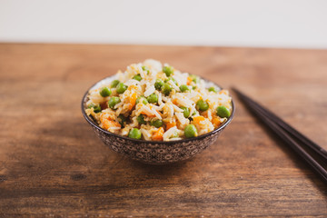 Oriental cantonese rice. Basmati rice with green peas, eggs and carrots.