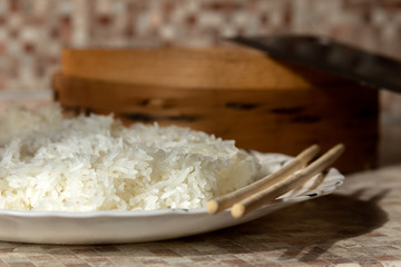 Rice cooked in a traditional wooden steamer has a special taste. You can eat it as a separate dish, as a side dish, or as an addition or ingredient to other dishes. My favourite is jasmine rice.