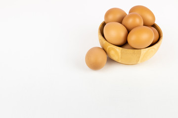 Raw chicken egg isolated on white background, space for text.