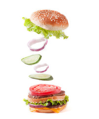 Burger in flight on a white background