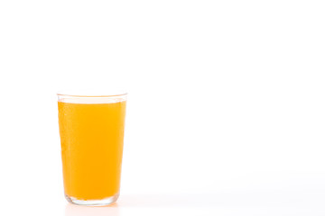 glass of orange juice on white