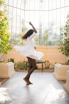 Dark Skin Woman Spinning Around