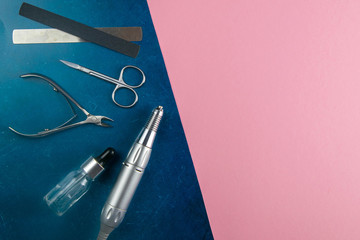 A set of cosmetic tools for manicure and pedicure. Manicure scissors, cuticles, saws, miller stand...
