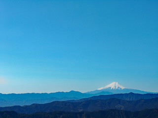 Mt.Fuji covered with snow and range of mountains