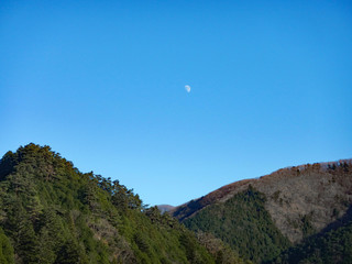 Half-Moon and range of mountains (Okutama lake, Ogochi dam, Okutama, Nishitama, Tokyo, Japan)